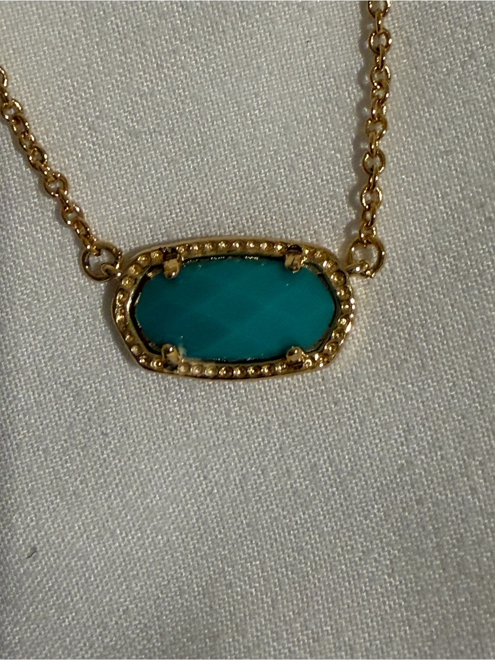Kendra Scott Gold Necklace with Teal Oval Stone. Only worn once.